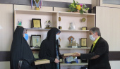 تقدیر از مادر و همسر شهید جلیلوند در دانشگاه جامع علمی کاربردی استان البرز
